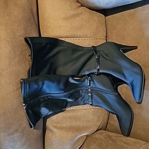 Tall black boots,  brand new.